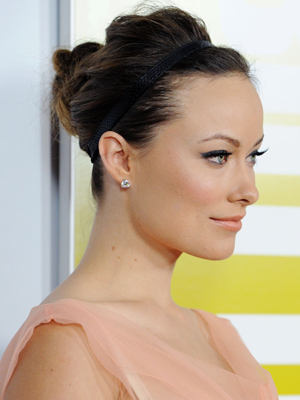 This look isn't just for the gym anymore. Add extra volume like Olivia Wilde, and it's perfect for a holiday party. (You get bonus points if you use a jeweled band.)
